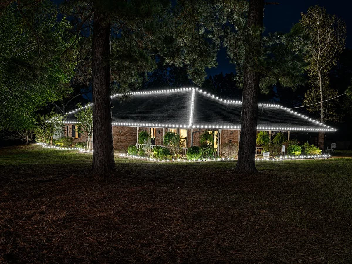 The Goswick family's own home, lit with a Lawn & Light kit